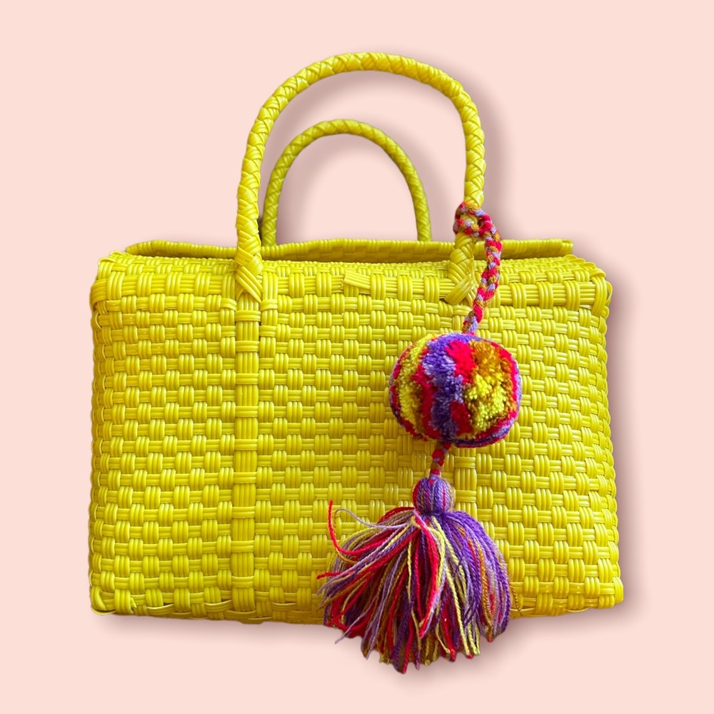 LIKELY yellow plastic woven bag NWOT